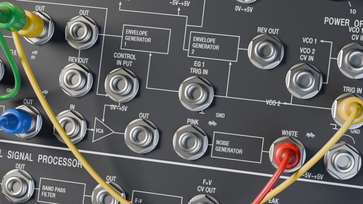 Close-up of the AT20V patch bay with yellow, red and blue cables